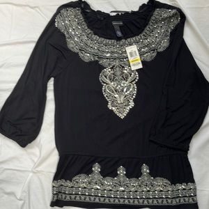 Black top with silver embroidered pattern